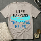 Life Happens · The Ocean Helps T-Shirt