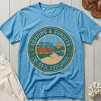 Surfing & Sunsets · Coastal Explorer - Badge T-Shirt